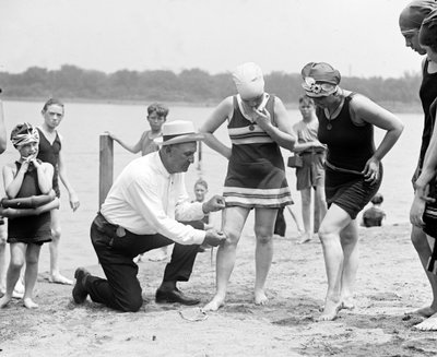 Measuring Bathing Suits, c.1922 by American Photographer